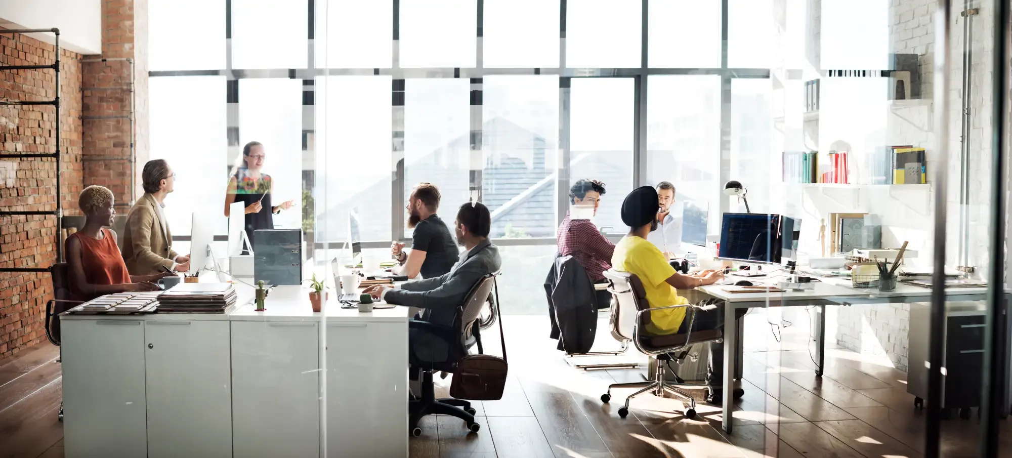A busy office space with people working at desks
